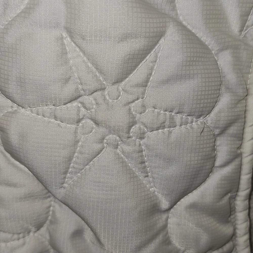 The North Face Women's Quilted White Snowflake Design Jacket